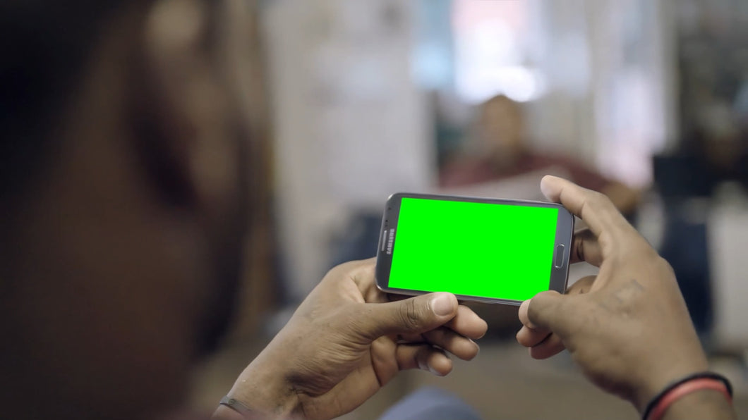 LeBron James Reacting to His Phone at the Barber Shop meme (Green Screen)