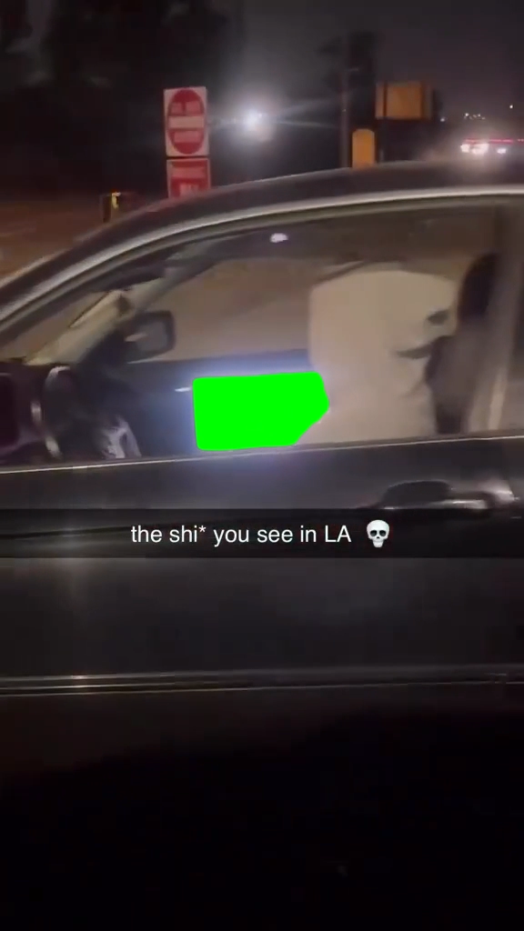 Man uses laptop while driving (Green Screen)